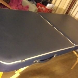 Massage table